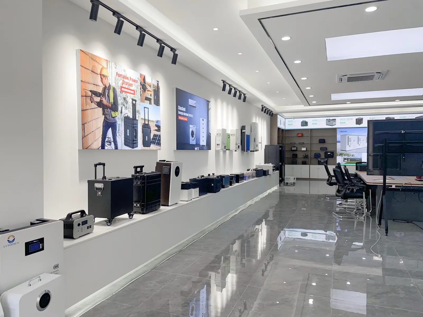 The showroom: portable power stations along the bench, wall-mounted stacked storage behind